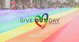 Give OUT Day logo on rainbow flag